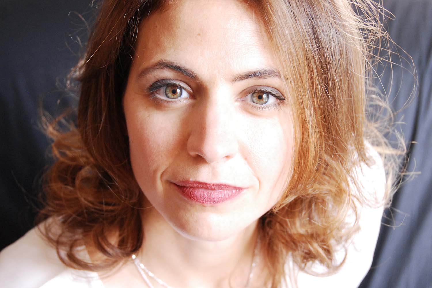 Portrait photography of a woman facing the camera.