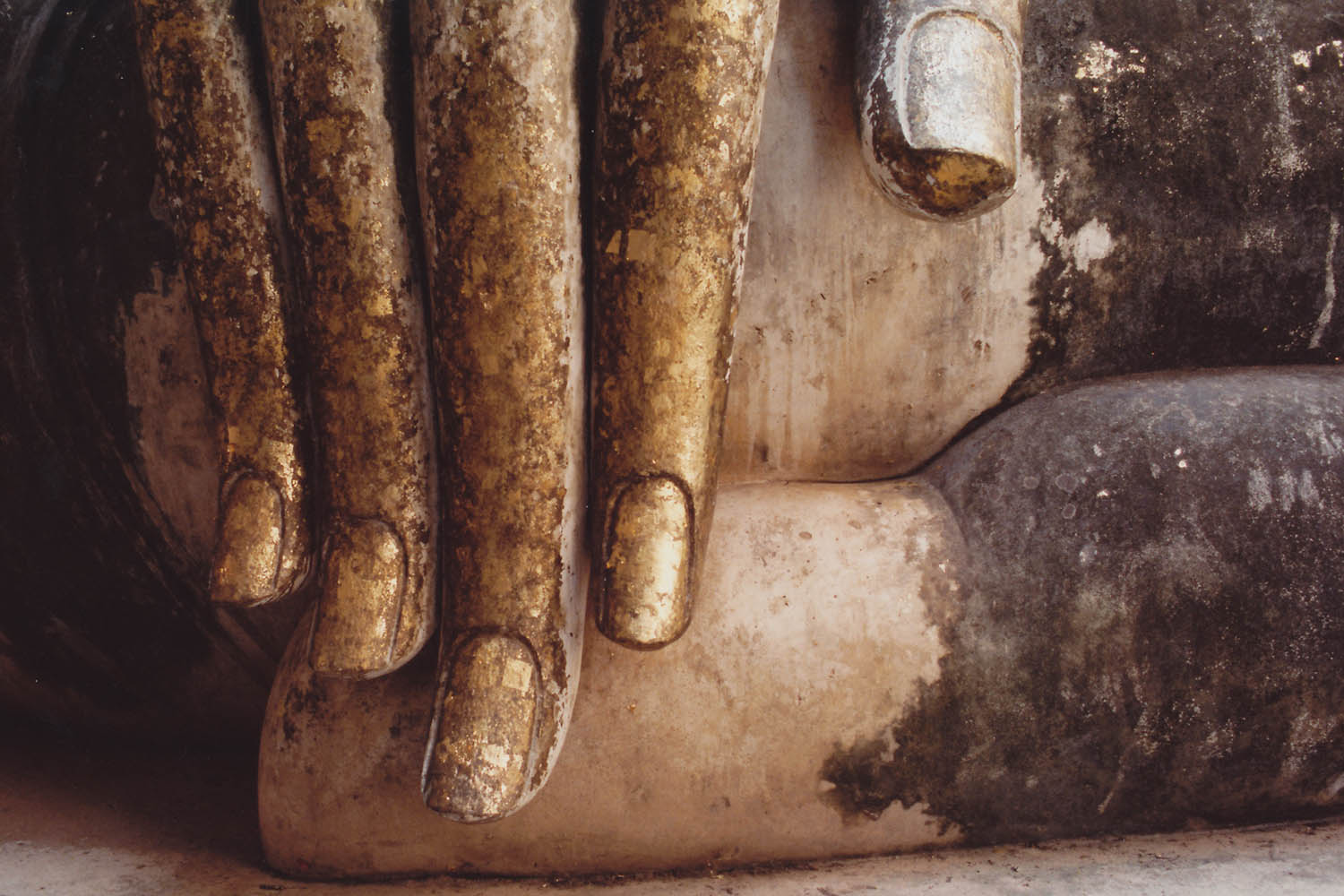 Fine art photography - Details of Buddha's hands, Sukhothai, Thailand.