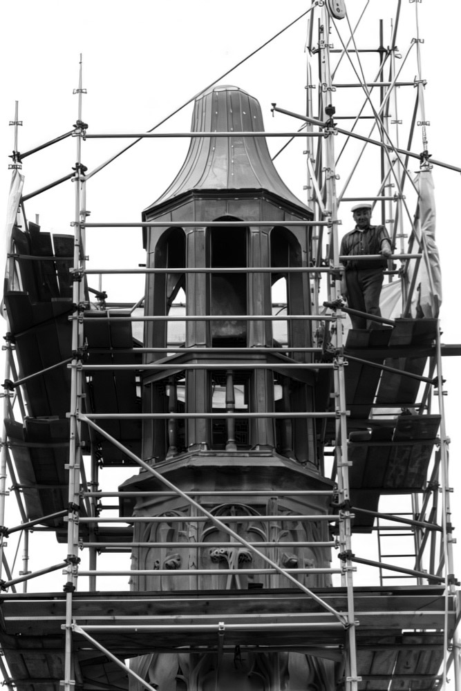 Interior and exterior architectural photography of a construction worker at Saint-Merri Church, Paris, France.