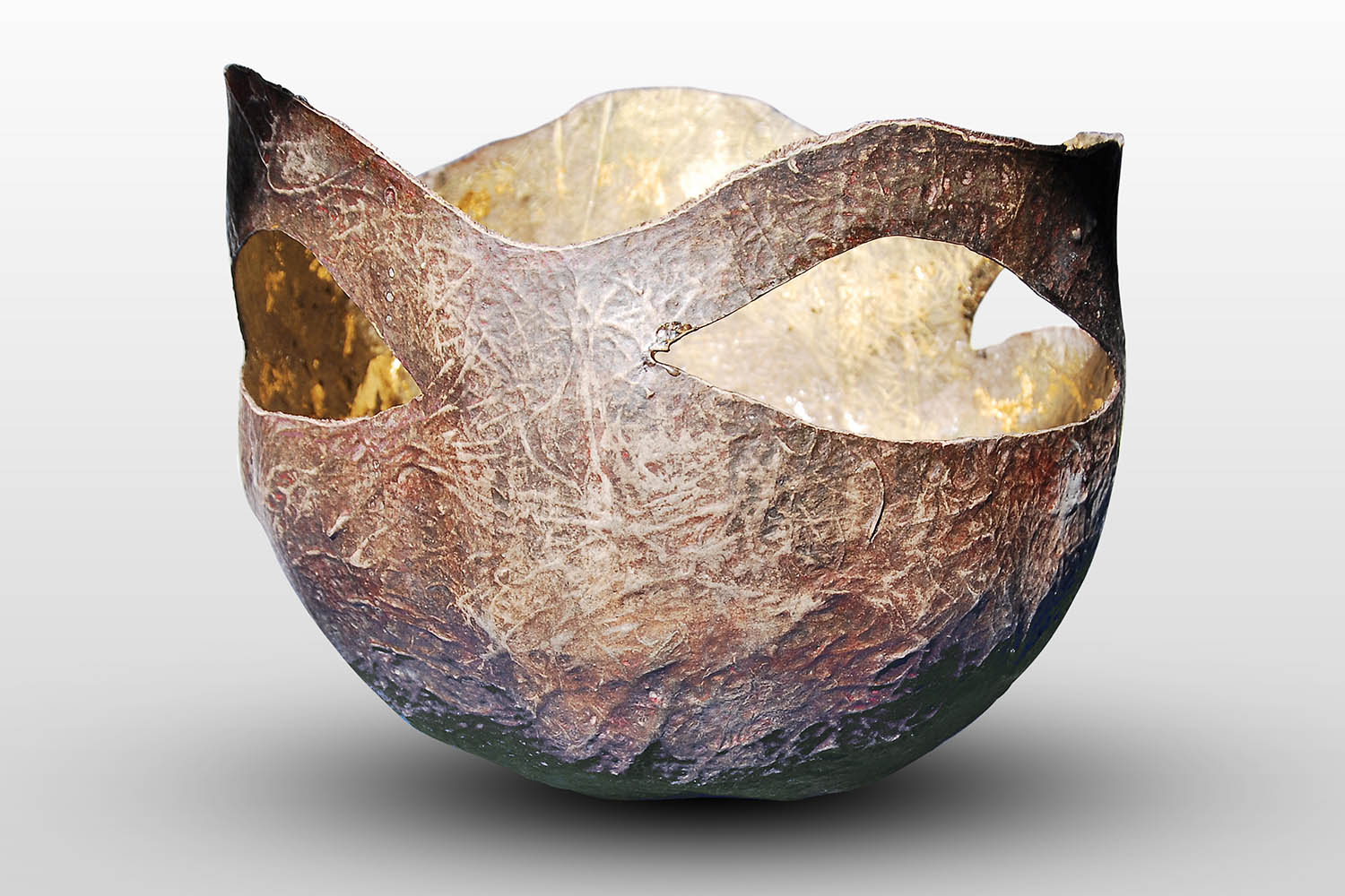 Artwork photographer - Bronze-colored mask-like vase by Geneviève Bonnieux.
