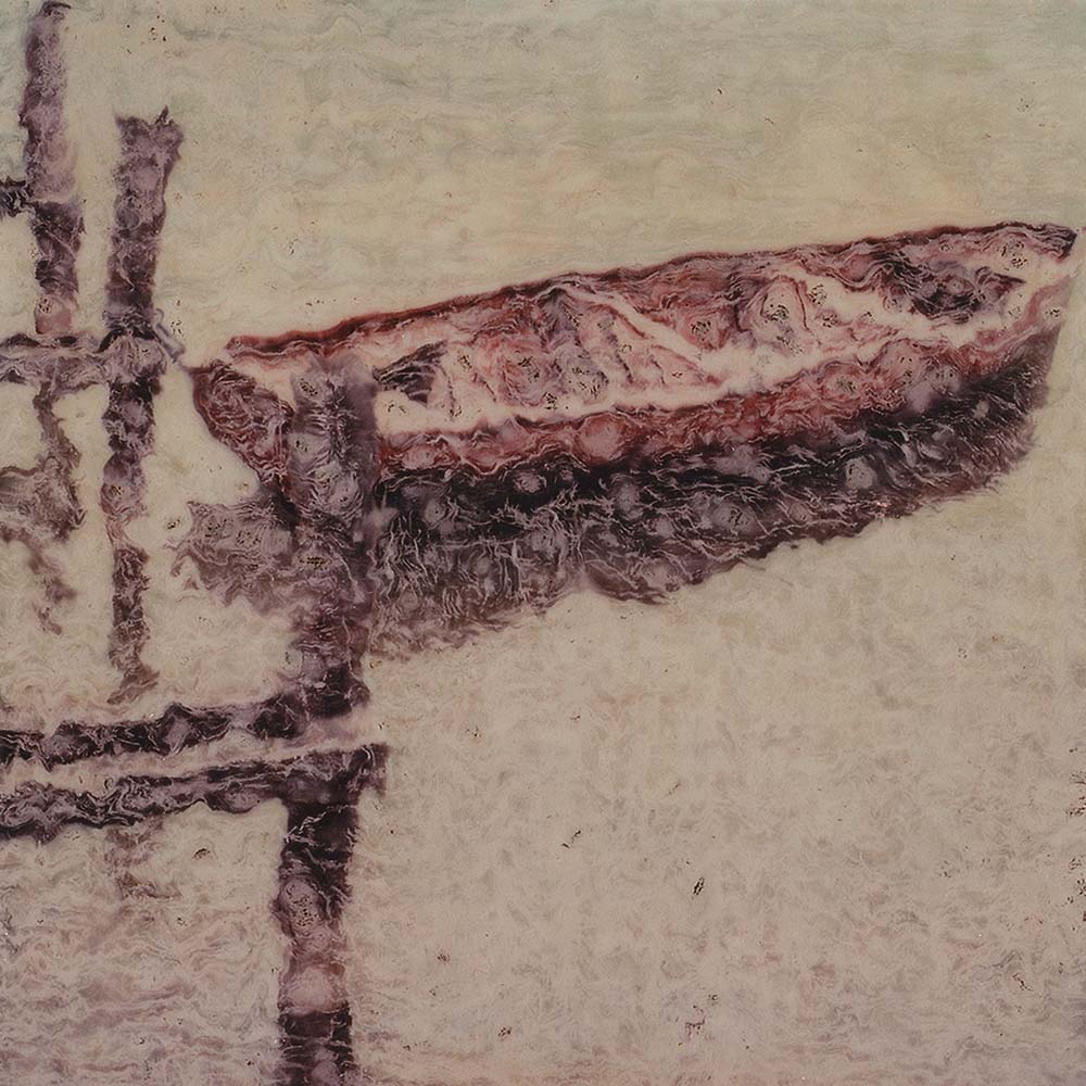 Photographie artistique - Image modifiée sur polaroid SX-70 d'une barque sur le lac d'Annecy, France.