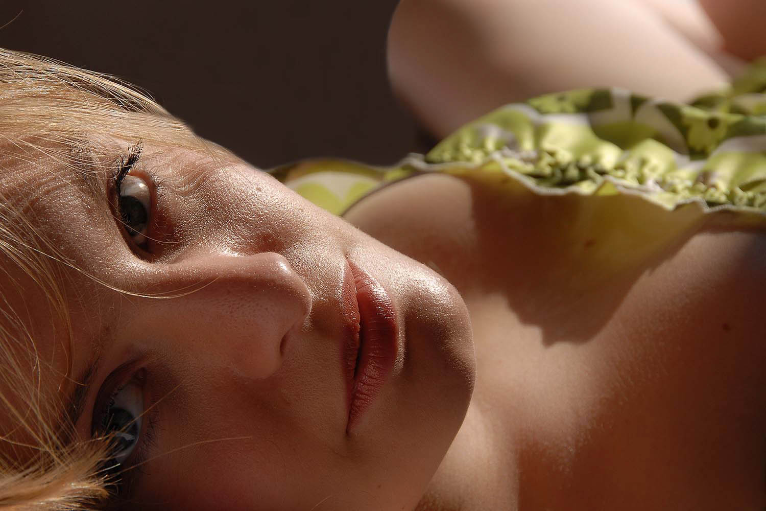 Portrait photography of Sophie in a colourful dress, soft lighting.