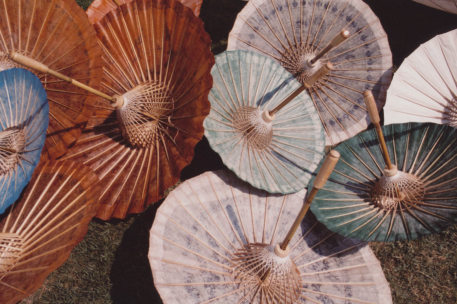 Fine art photography - Different colored parasols drying in the sun, Chiang Mai, Thailand.