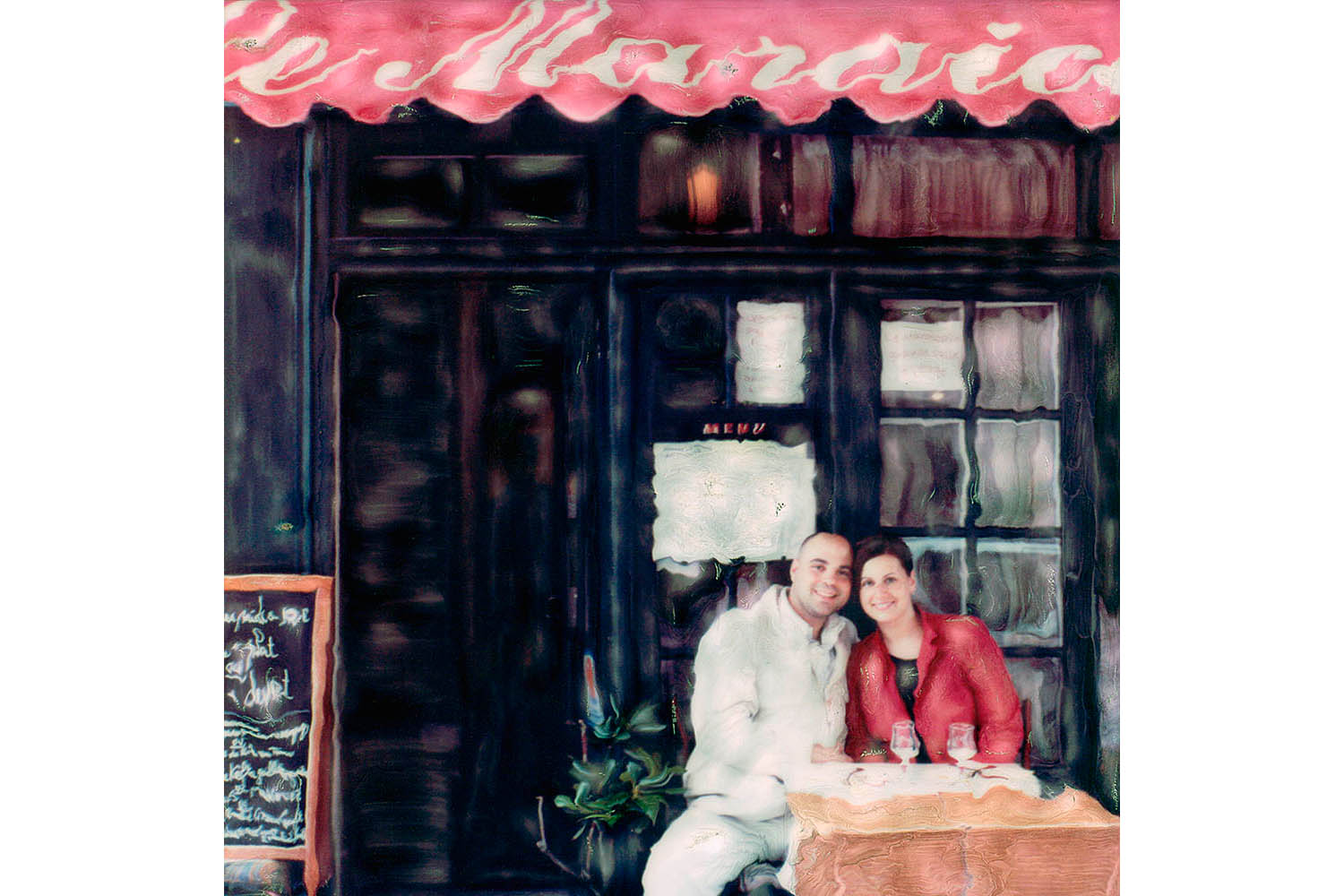Portrait sur polaroid modifiée d'un couple assis à une terrasse de café à Paris.